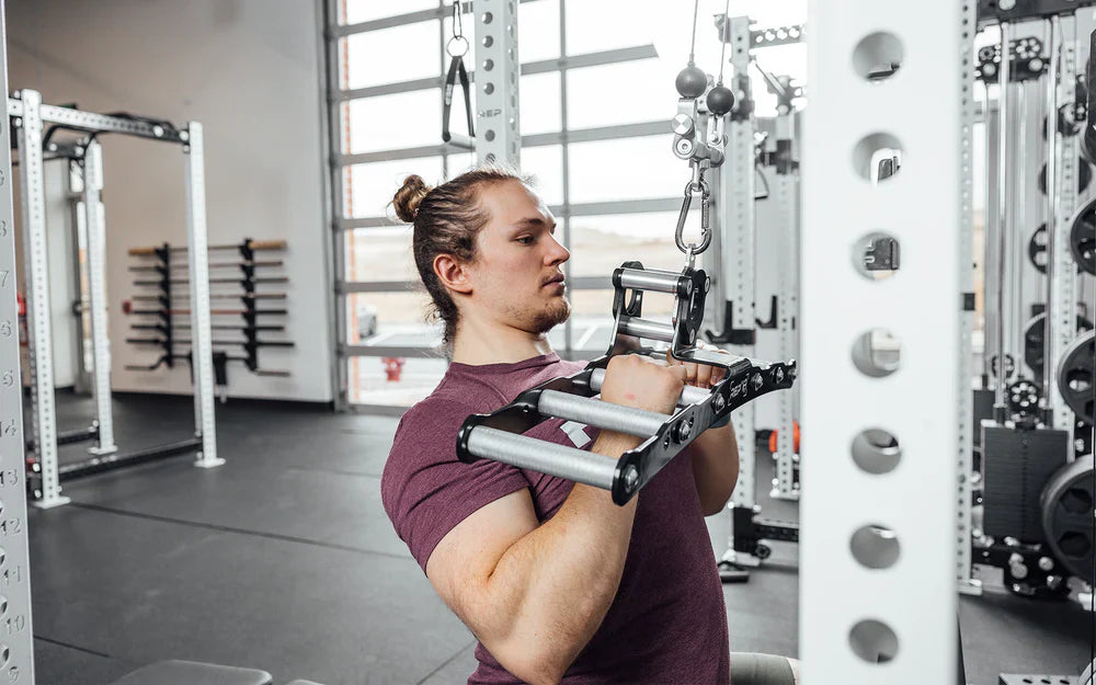 Rep Fitness - Man using Rep x Kleva multigrip handle for lat pull downs - Gym Equip