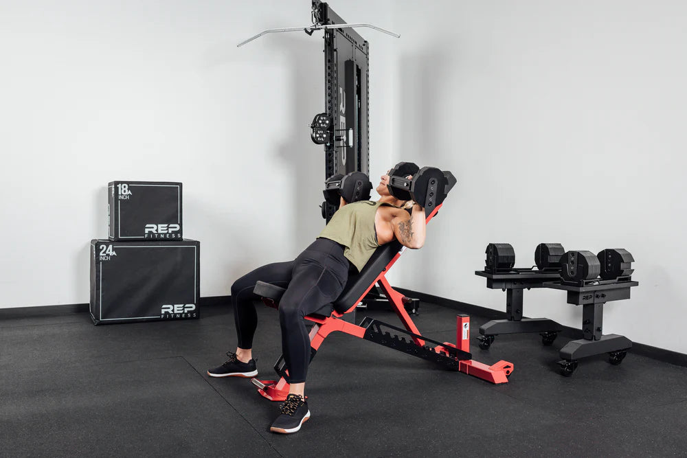 Rep Fitness - Nighthawk Adjustable bench being used for incline dumbbell bench press - Gym Equip