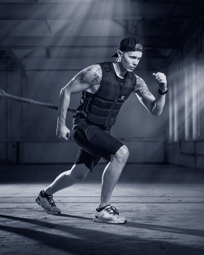 Action shot of man wearing Evrvest Weighted vest | Gym Equip