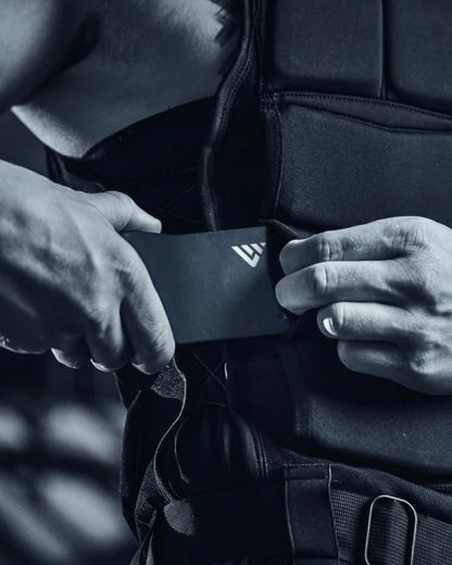 Inserting weight into Evrvest Weighted vest | Gym Equip